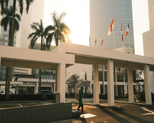 Urban office worker enjoying a comfortable walk in Jakarta